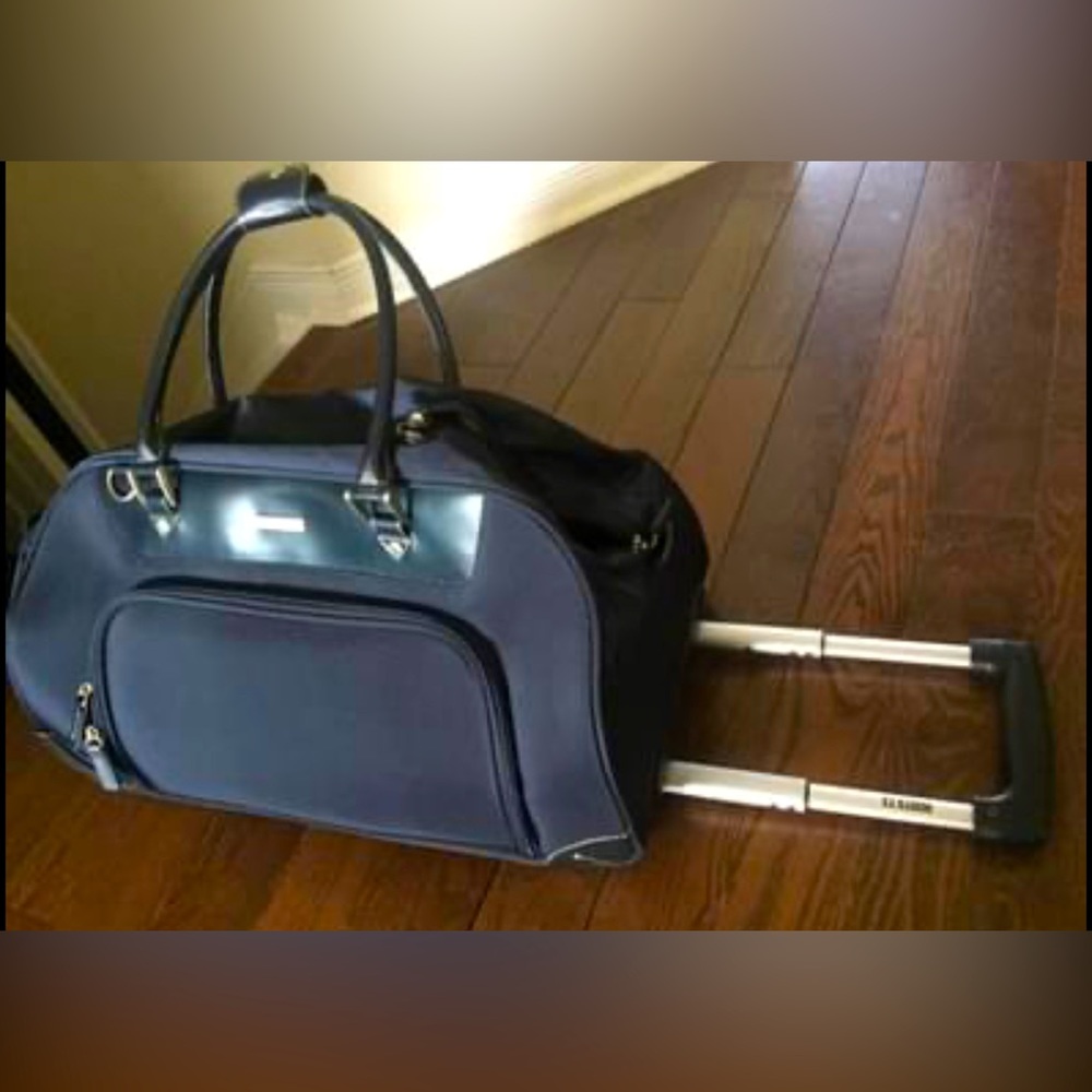 Roots small pickup duffel on wheels